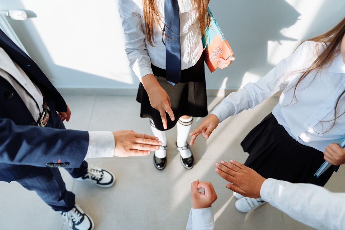 Children in coordinated school uniforms