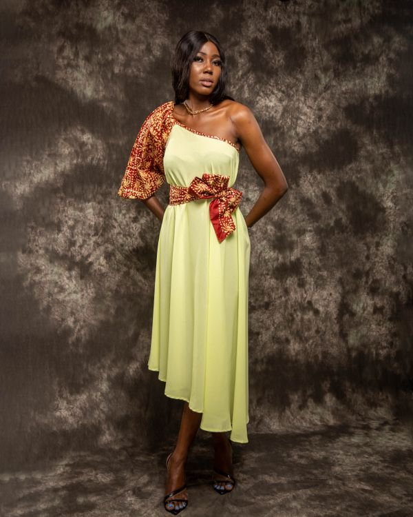 Woman modelling a contemporary yellow dress